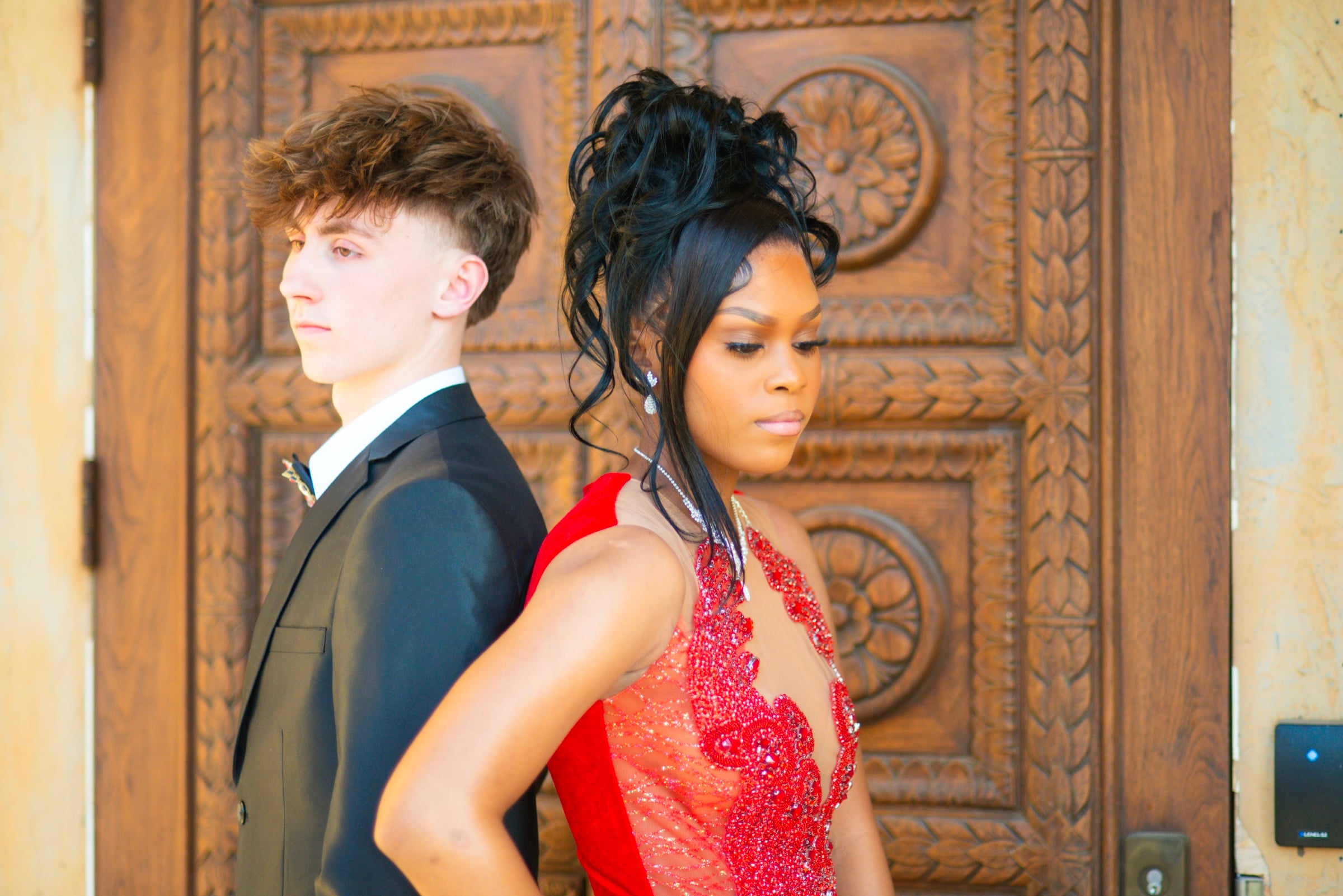 Editorial portrait at carved door