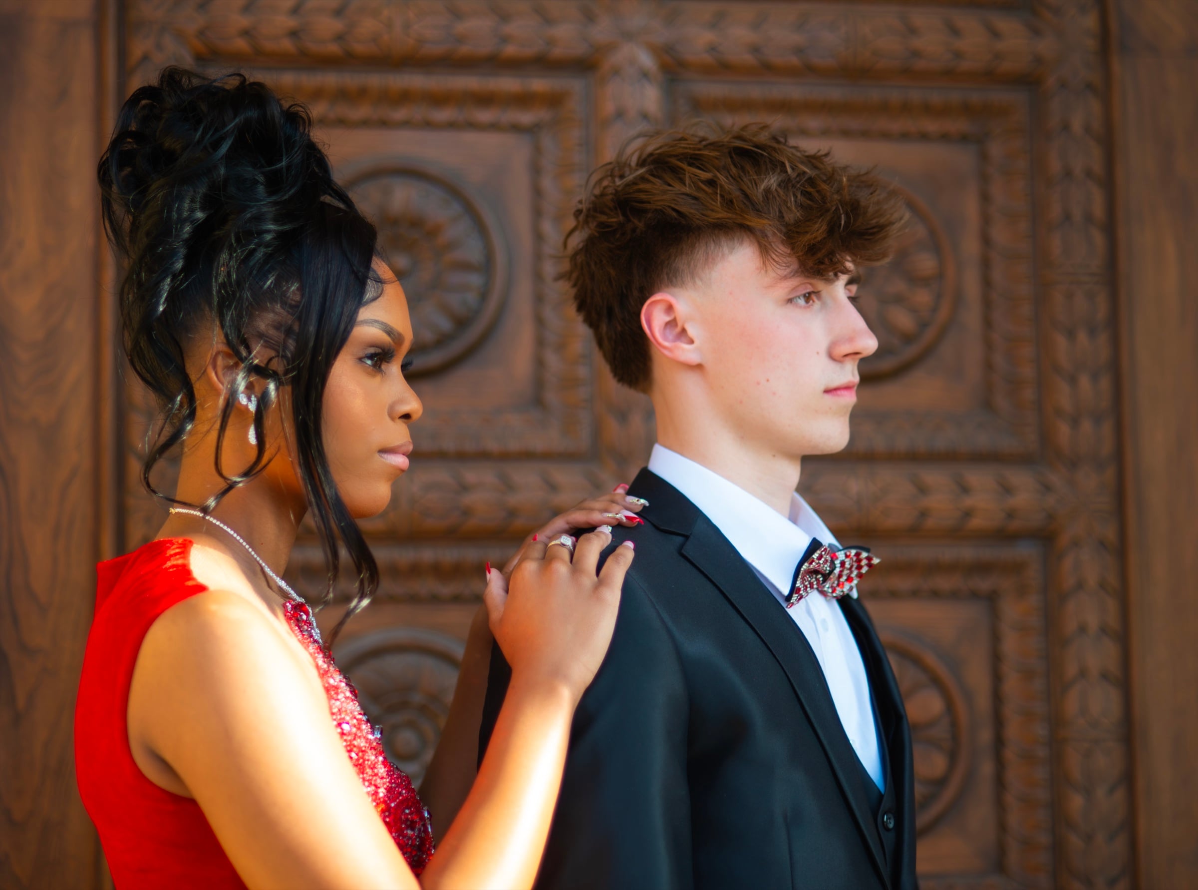 Senior couple at ornate door