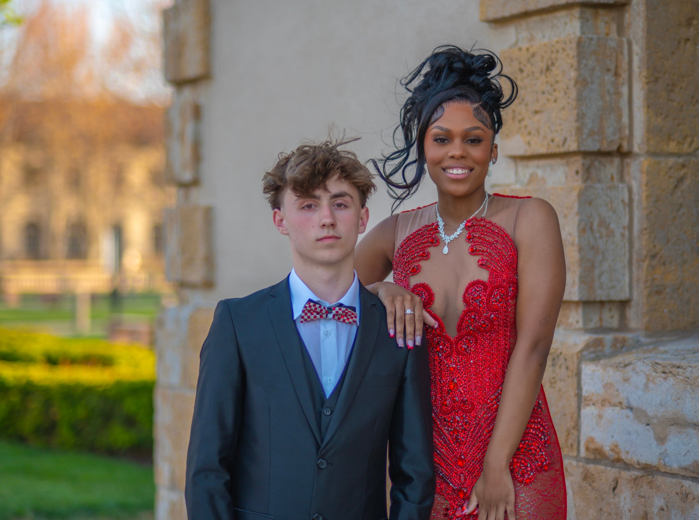 Senior portrait at stone archway