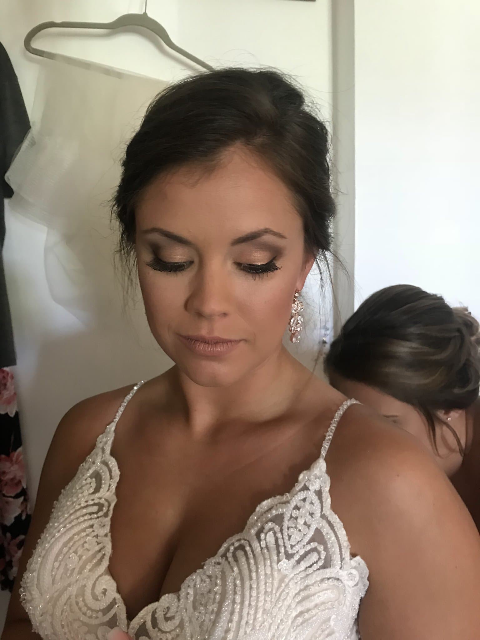 Bridal makeup with smoky eye and nude lip